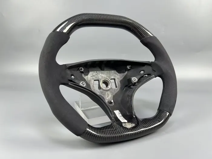 Mercedes-Benz AMG carbon fiber flat-bottom steering wheel angled view by REVUP Lebanon